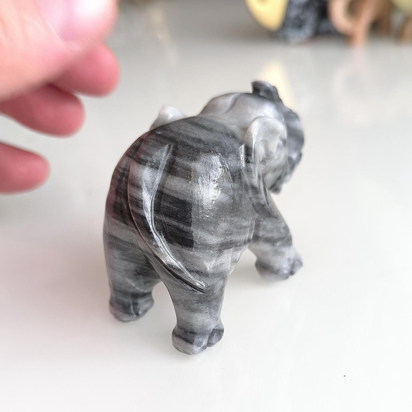 Handmade, small gray Asian elephant statue with raised trunk, 1980s