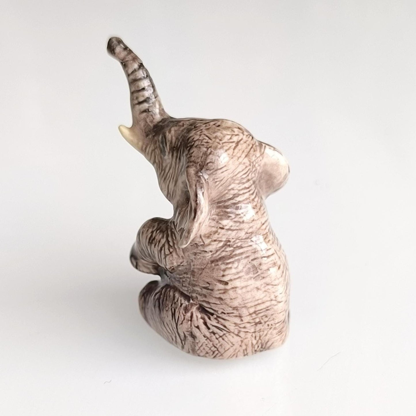 Gray Glazed Ceramic Sitting Elephant Trunk Up 1970s