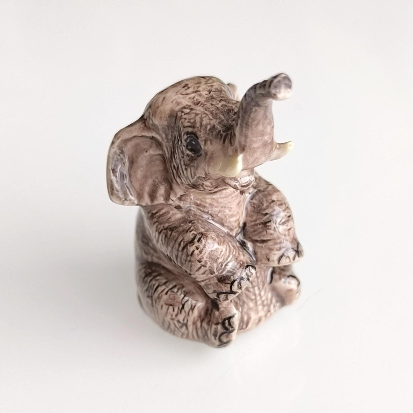 Gray Glazed Ceramic Sitting Elephant Trunk Up 1970s