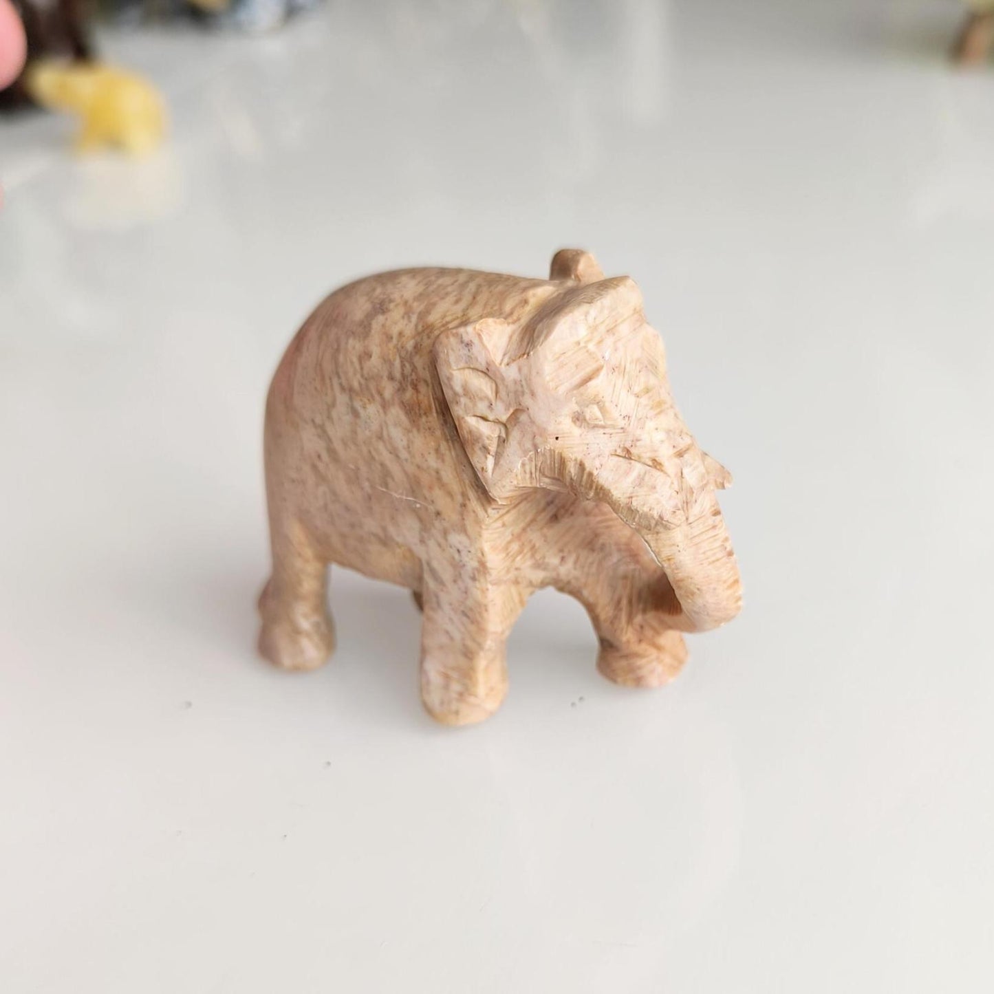 Handmade Small Light Brown Soapstone Elephant Statue with Lowered Trunk, 2000s