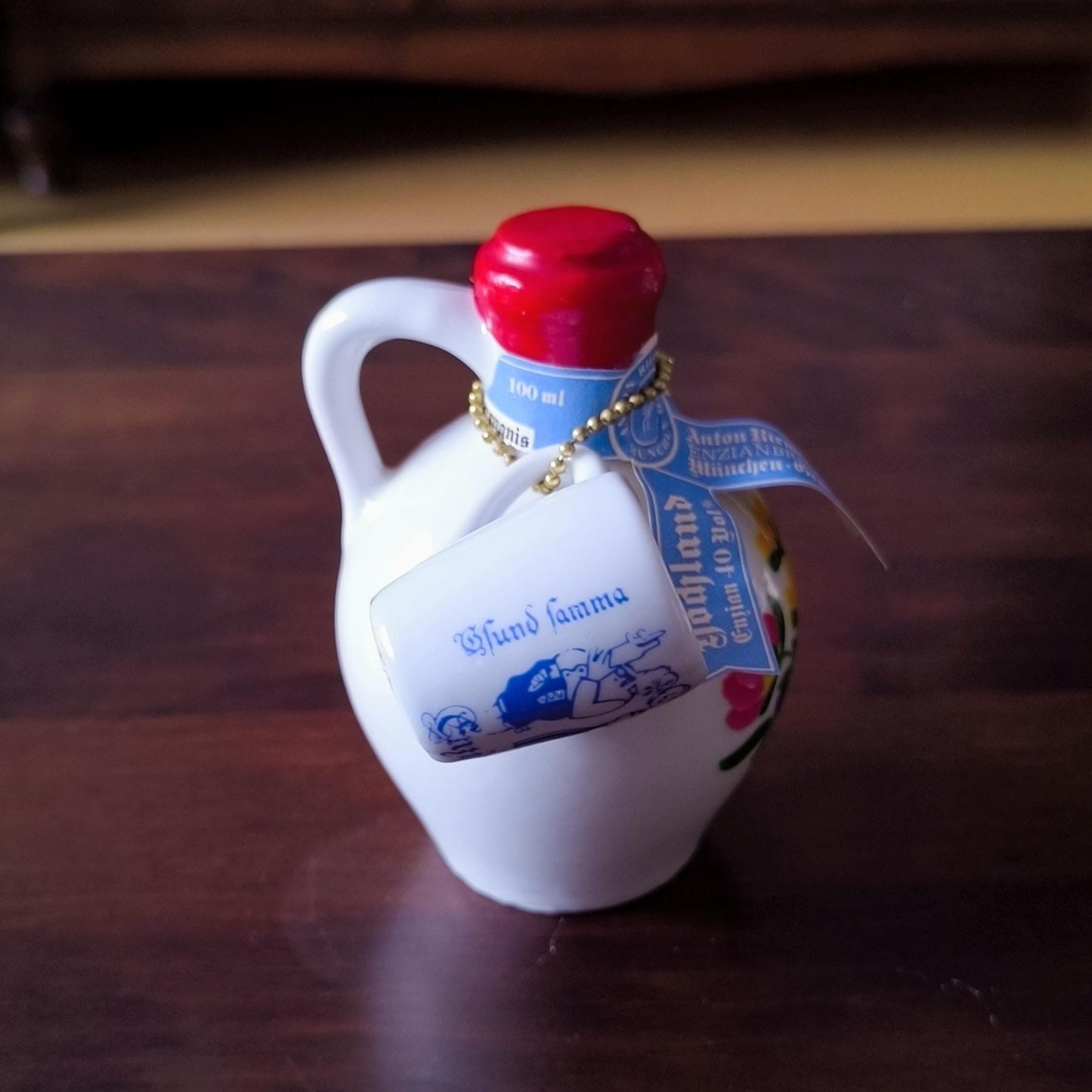 Godjland Mini Porcelain Bottle with Hand-Painted Lily Design & Cup