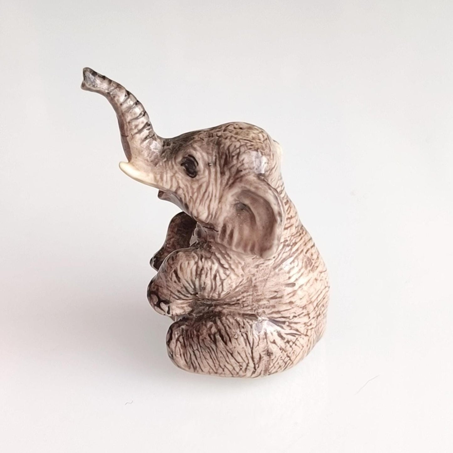 Gray Glazed Ceramic Sitting Elephant Trunk Up 1970s