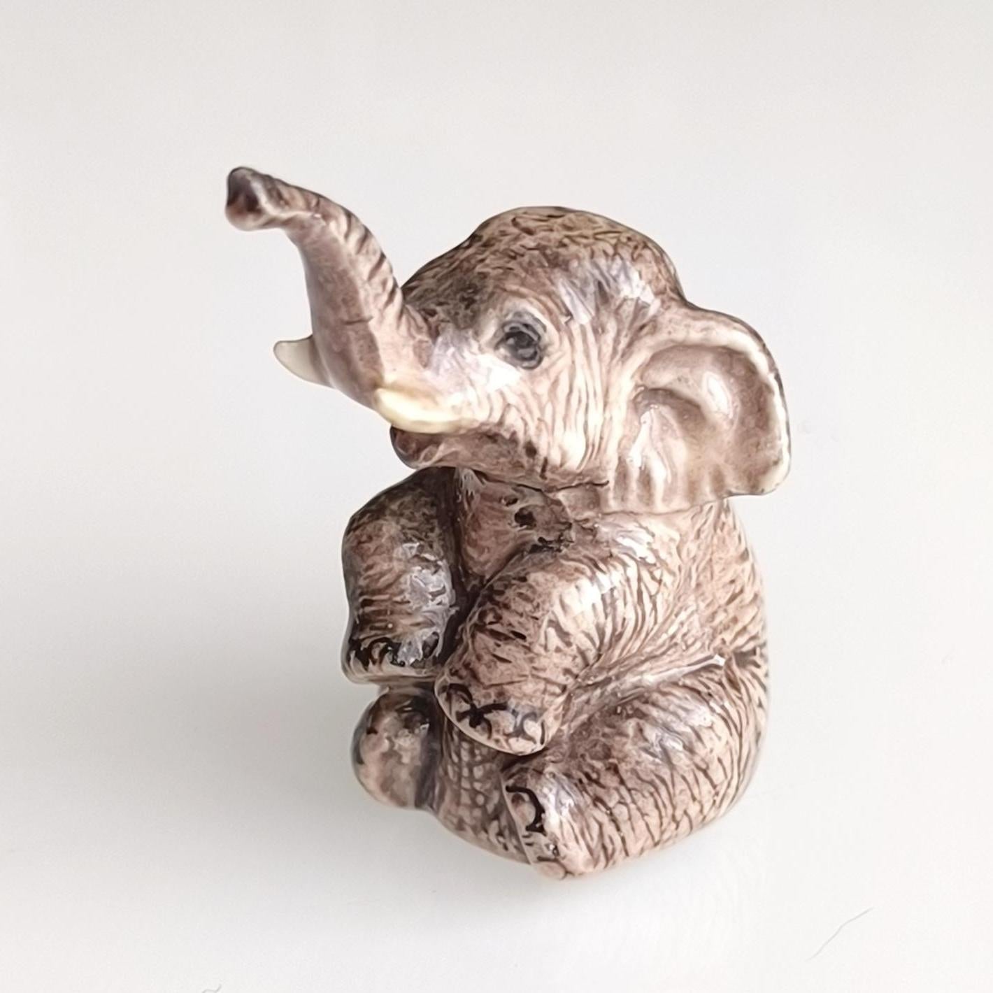 Gray Glazed Ceramic Sitting Elephant Trunk Up 1970s