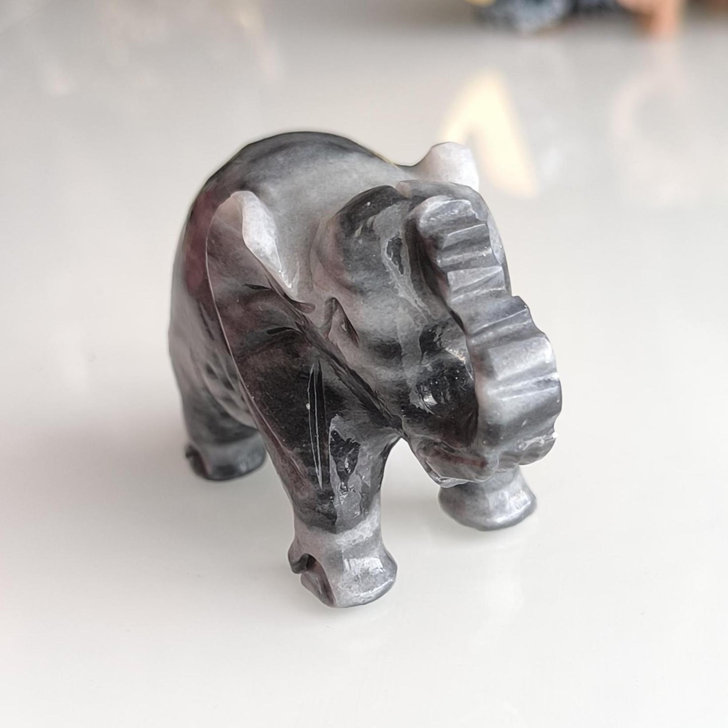 Handmade, small gray Asian elephant statue with raised trunk, 1980s