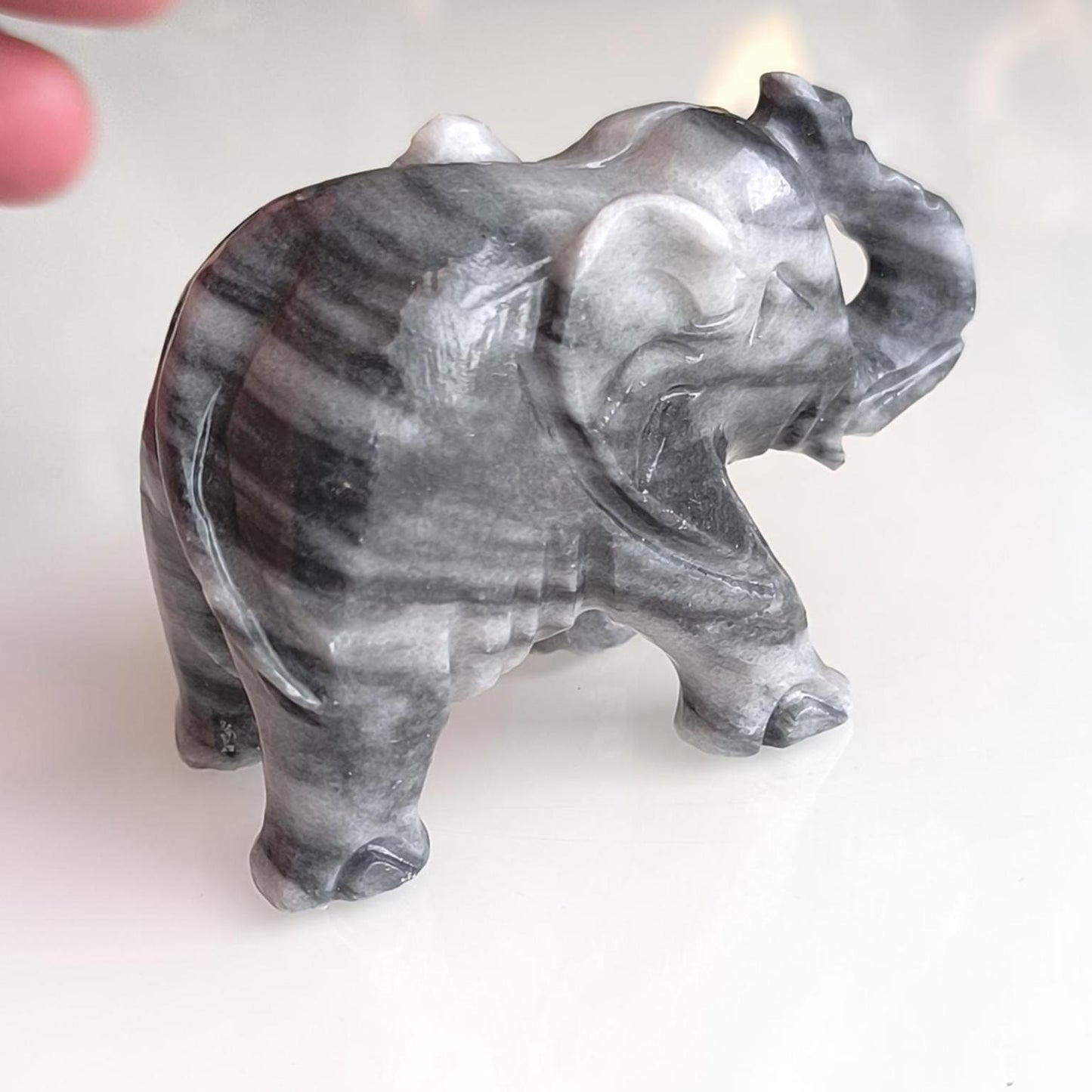 Handmade, small gray Asian elephant statue with raised trunk, 1980s