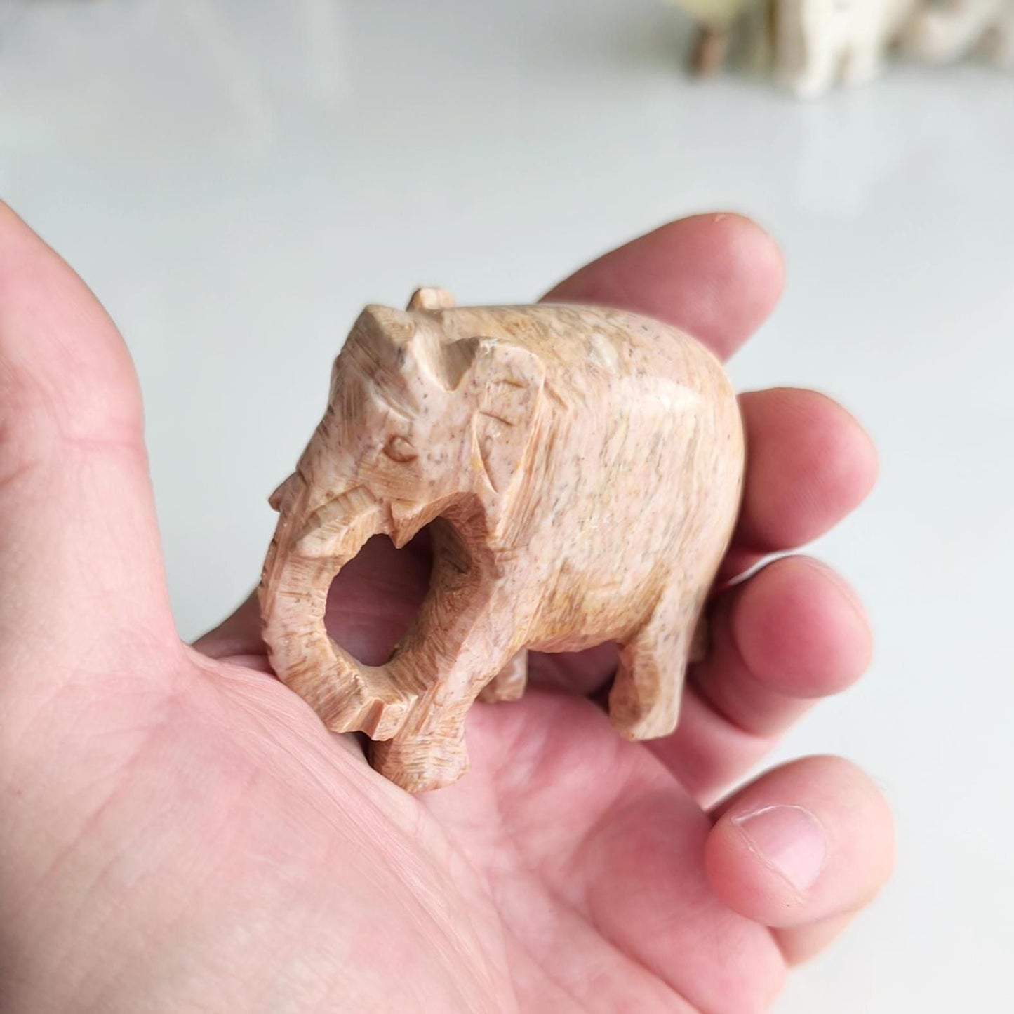 Handmade Small Light Brown Soapstone Elephant Statue with Lowered Trunk, 2000s