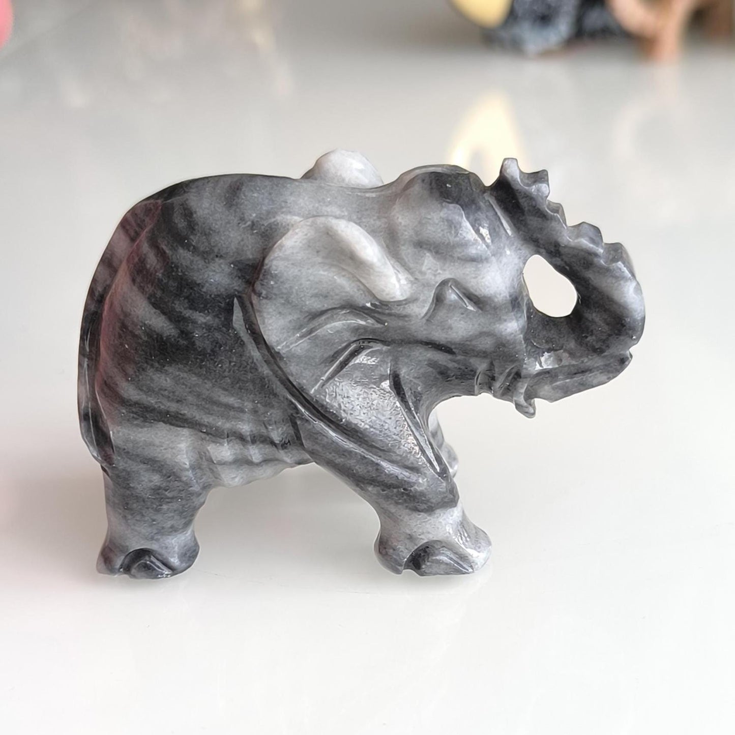 Handmade, small gray Asian elephant statue with raised trunk, 1980s