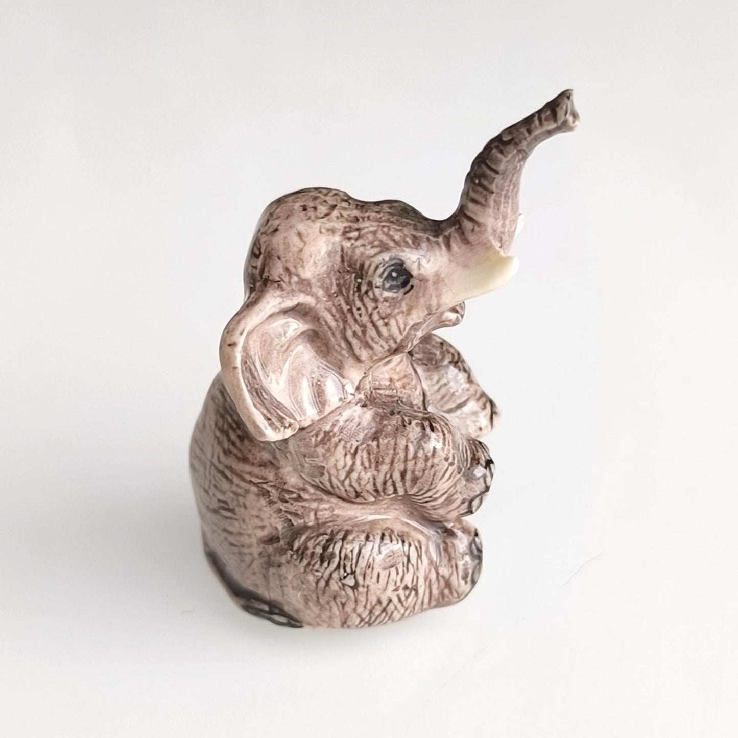 Gray Glazed Ceramic Sitting Elephant Trunk Up 1970s