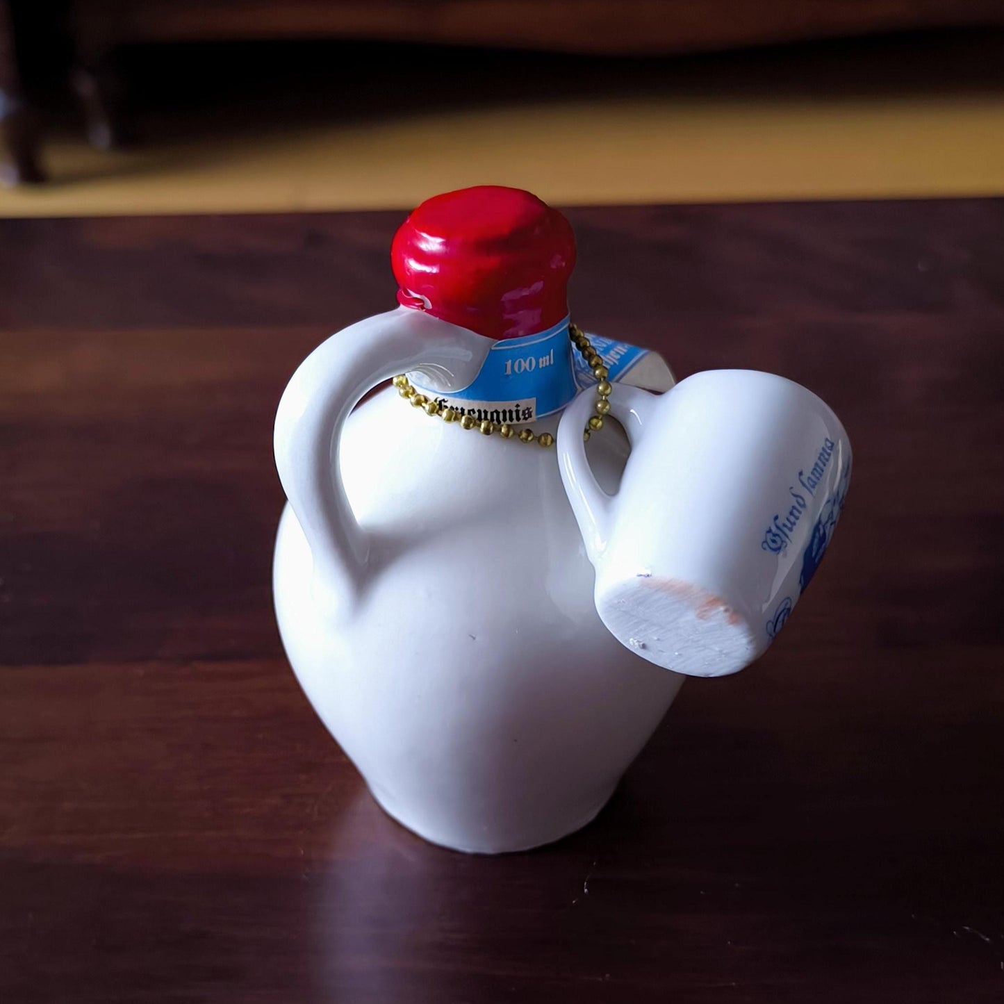 Godjland Mini Porcelain Bottle with Hand-Painted Lily Design & Cup