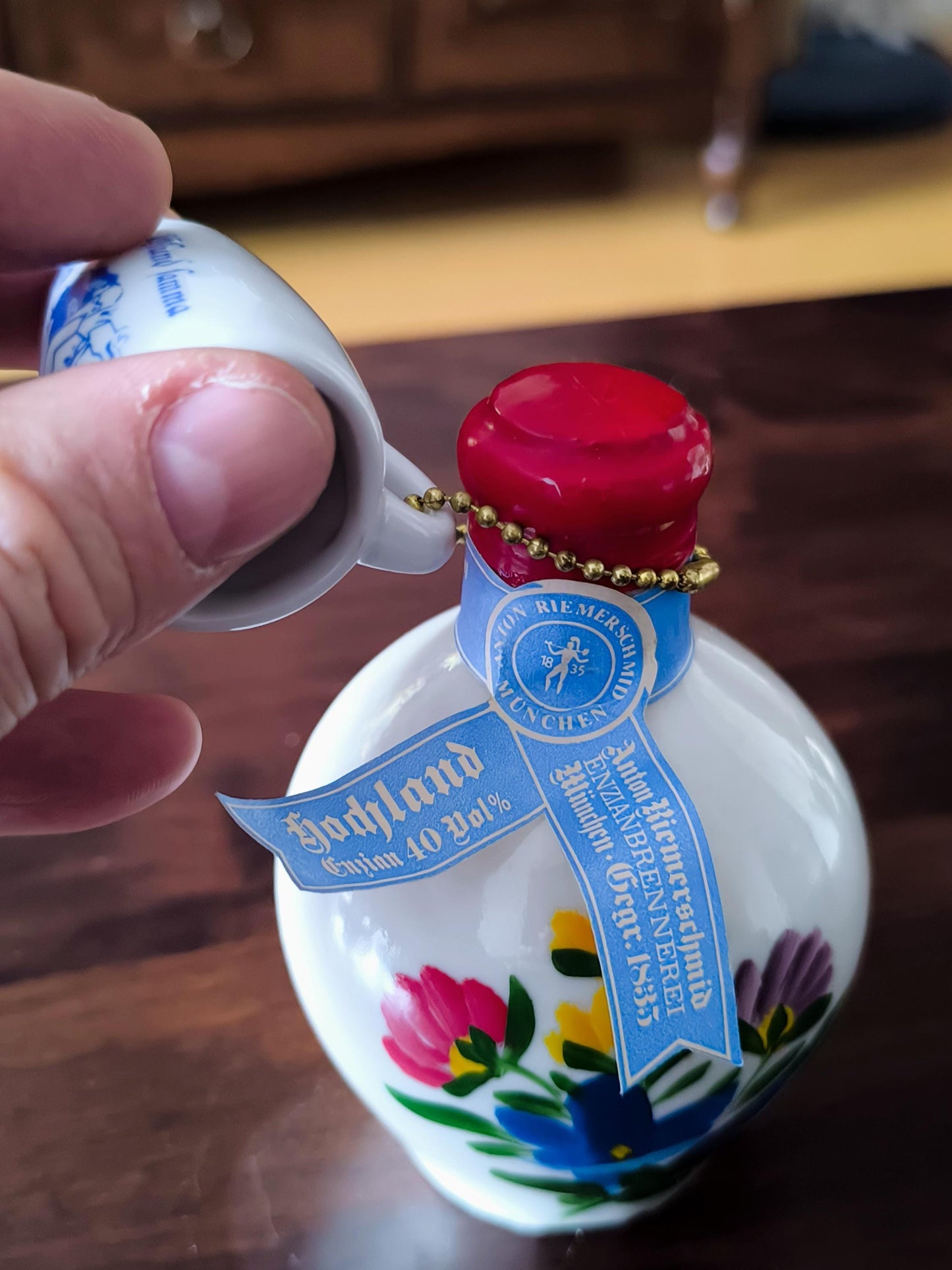 Godjland Mini Porcelain Bottle with Hand-Painted Lily Design & Cup