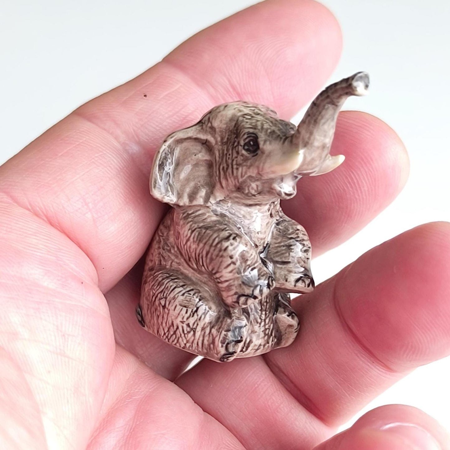 Gray Glazed Ceramic Sitting Elephant Trunk Up 1970s