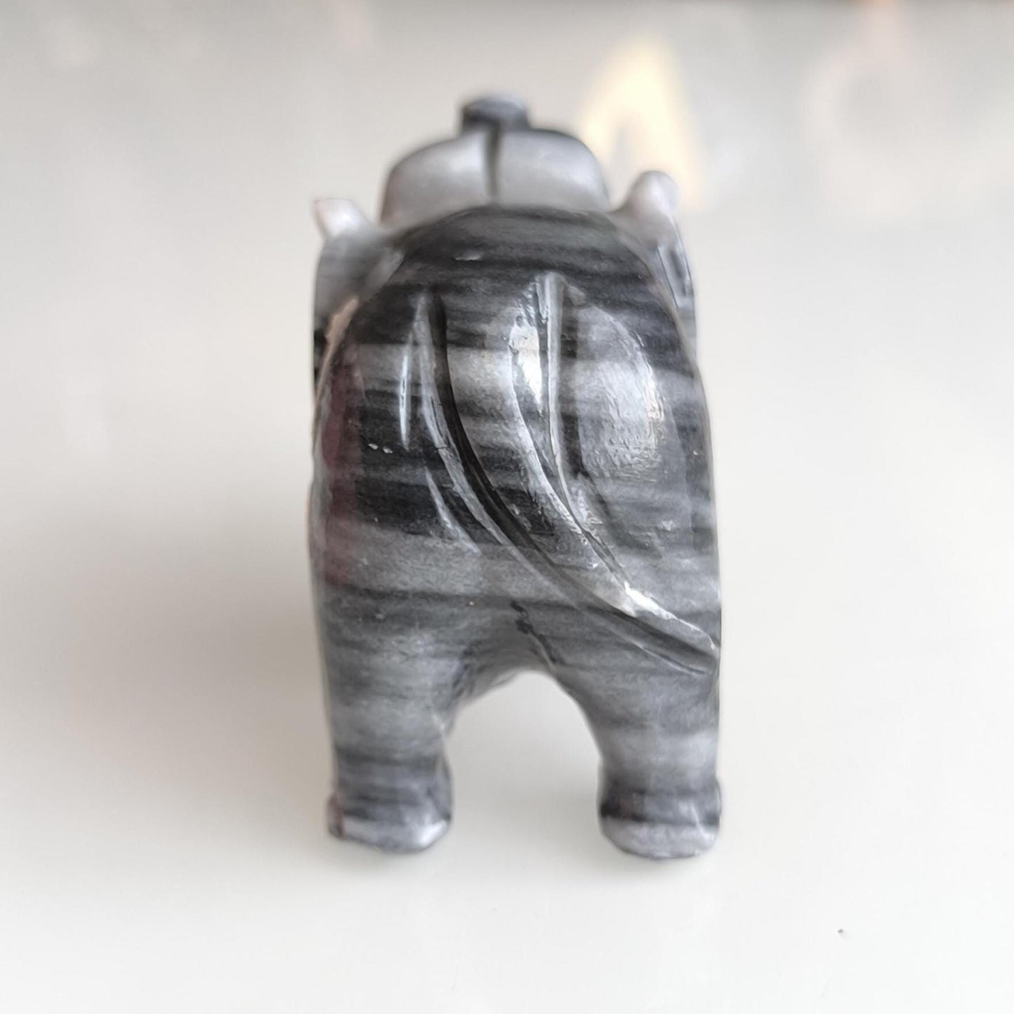 Handmade, small gray Asian elephant statue with raised trunk, 1980s