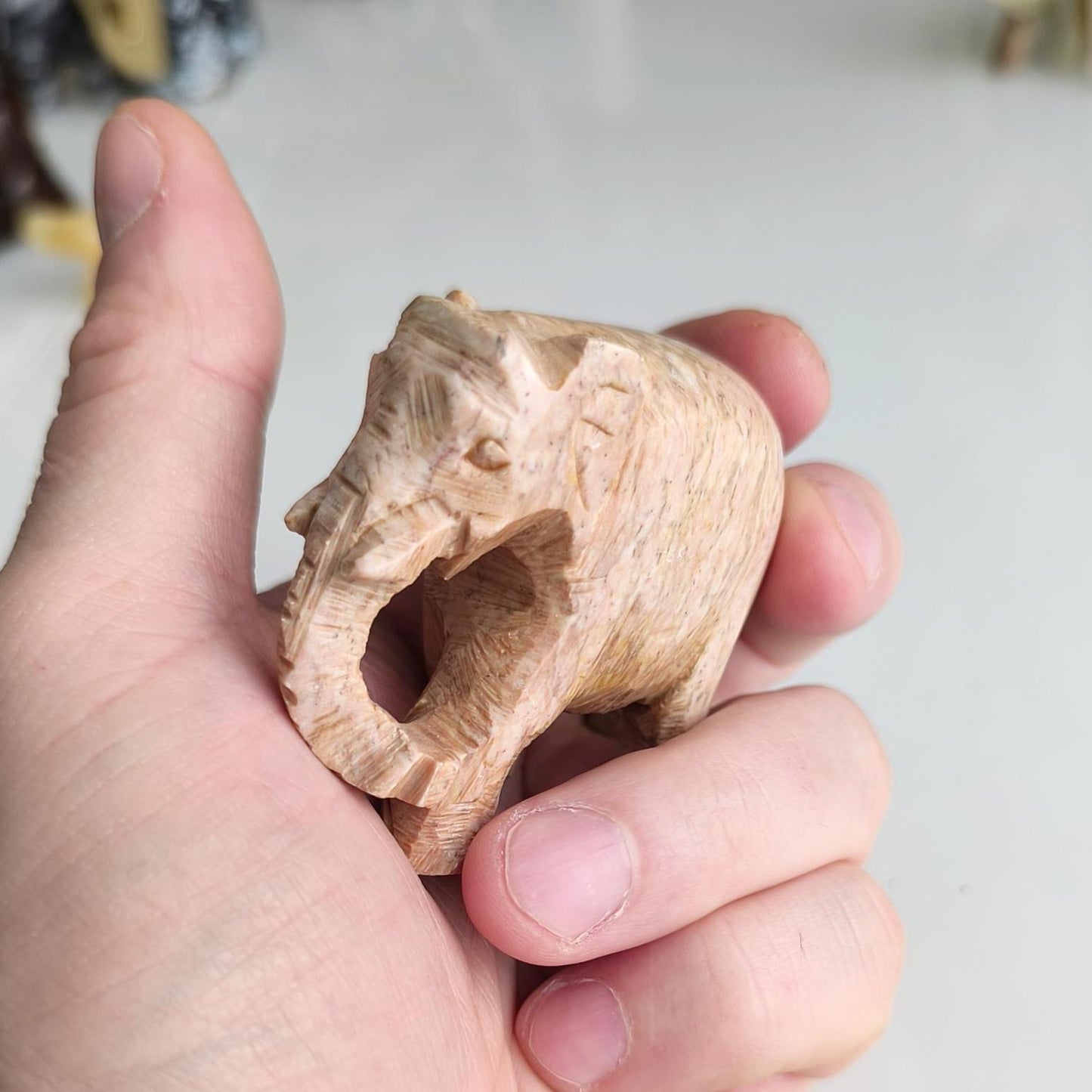 Handmade Small Light Brown Soapstone Elephant Statue with Lowered Trunk, 2000s