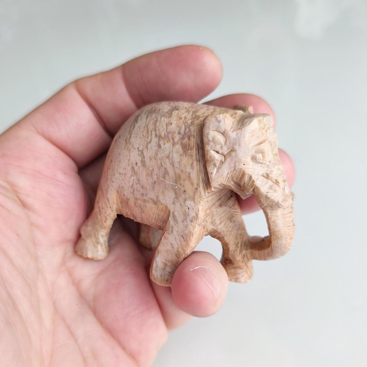 Handmade Small Light Brown Soapstone Elephant Statue with Lowered Trunk, 2000s