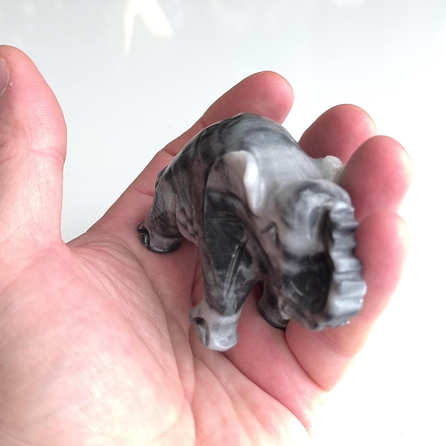 Handmade, small gray Asian elephant statue with raised trunk, 1980s