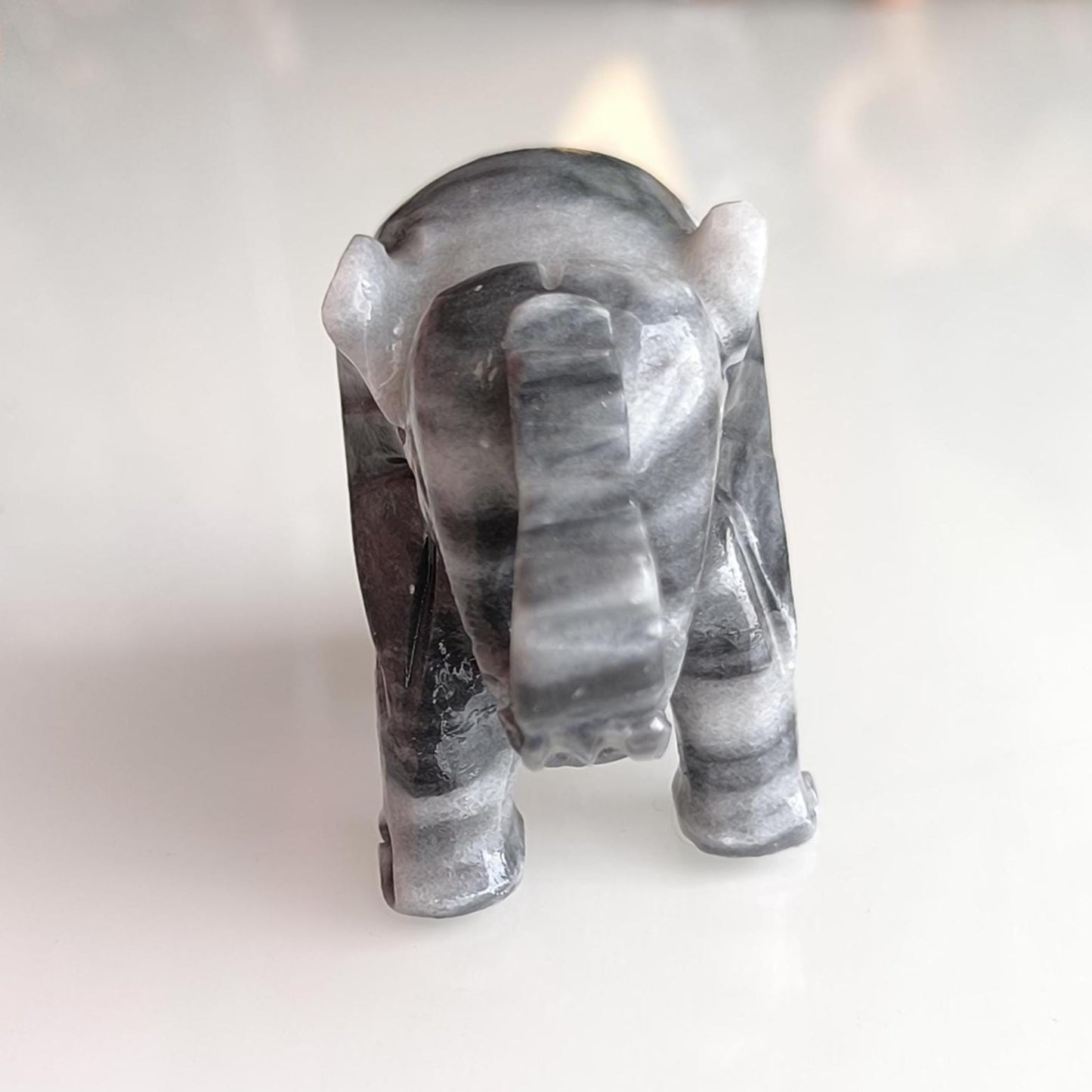 Handmade, small gray Asian elephant statue with raised trunk, 1980s