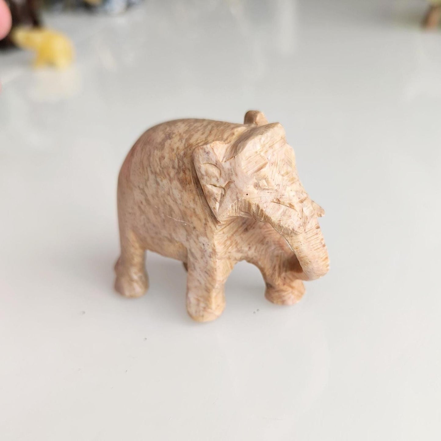 Handmade Small Light Brown Soapstone Elephant Statue with Lowered Trunk, 2000s